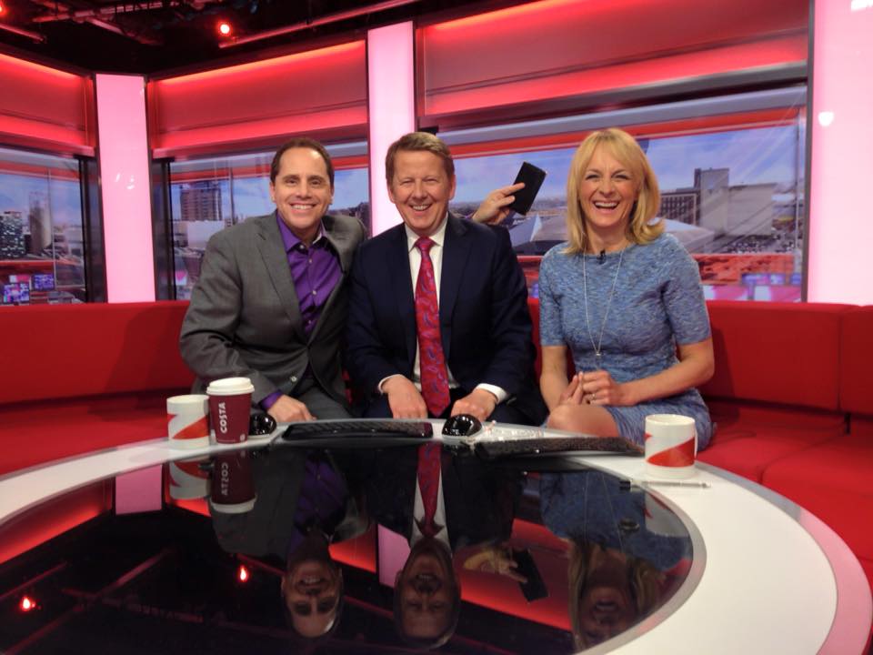 Three people on a BBC Breakfast set discussing personal security.