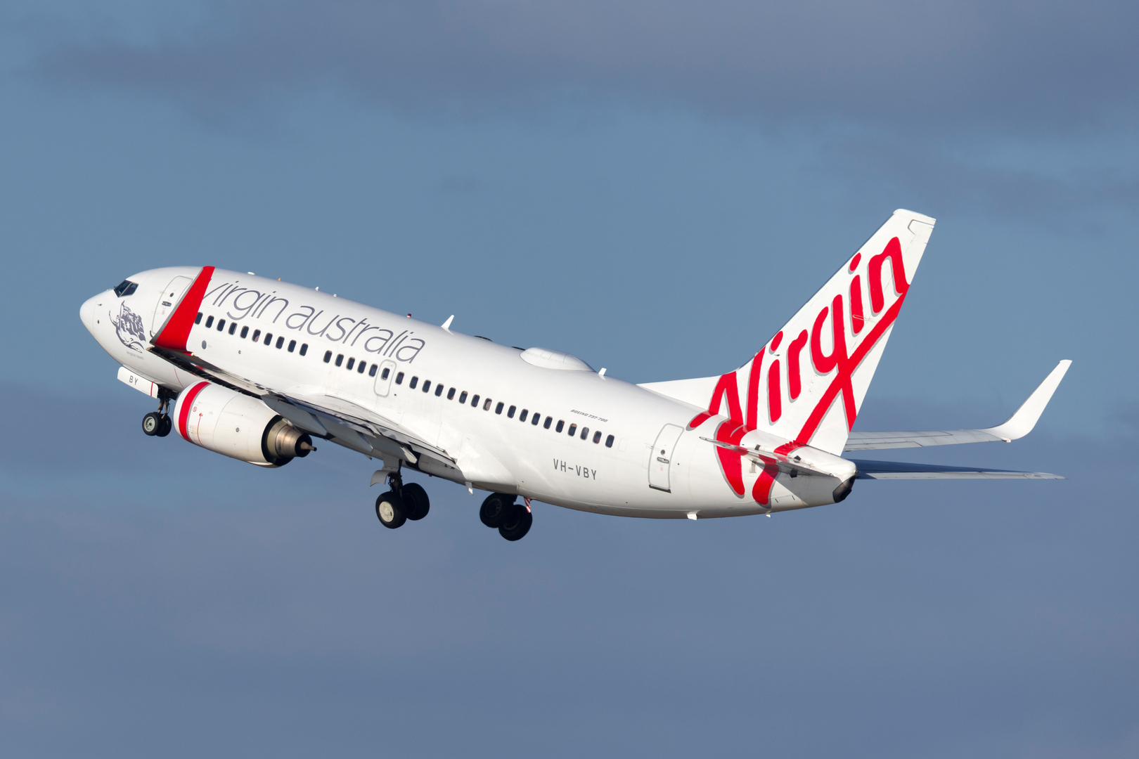 Virgin Australia Boeing 737 airliner landing at Sydney Airport.